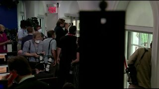 President abruptly escorted from press briefing