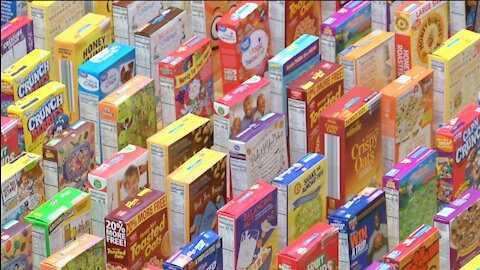 Racine elementary school creates 2,300 cereal box domino chain for charity