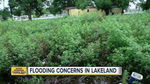 Rain causing flood waters to rise in Lakeland