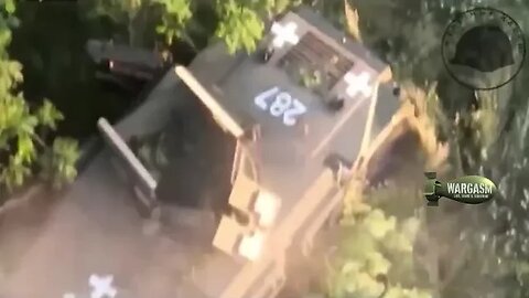 Drone drops grenades on Ukrainian Humvee in Zaporozhye