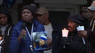 Vigil for man shot by masked gunmen while decorating Christmas tree