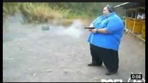 Fat guy shoot a gun