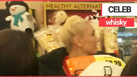 Blake Shelton and Gwen Stefani buy SEVERAL bottles of whiskey on Christmas day