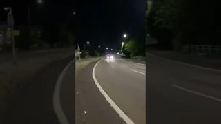 GLOWING ORANGE DISC BRAKES AT THE STREET RACING