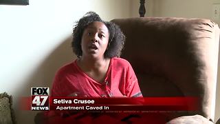 Apartment caves in on woman and her son