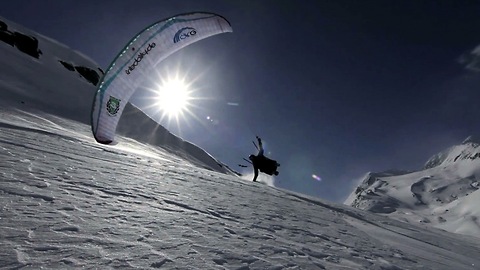 Paraglider Performs Extreme Stunts Over Alaskan Mountains