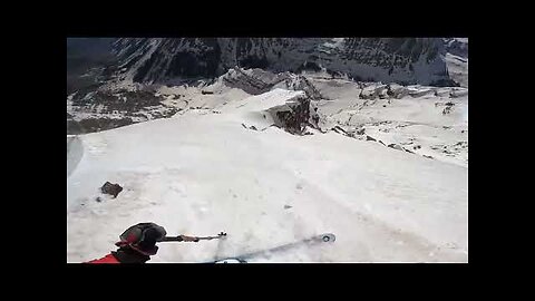 A skier falls : east face of maroon peak