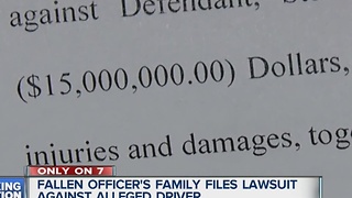 Officers family sues over his death