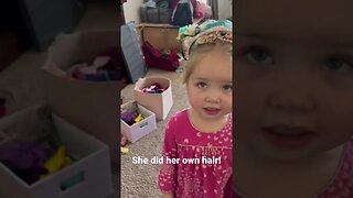 Toddler does her Hair