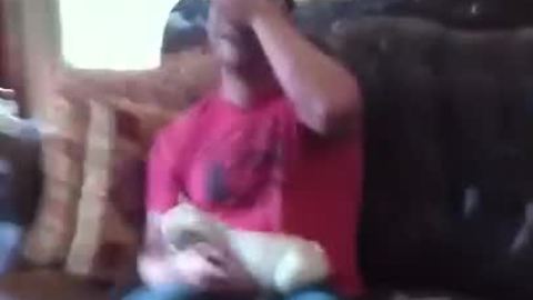 Man Get Surprised With French Bulldog Puppy