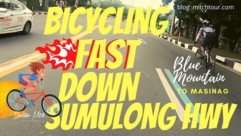 BICYCLING FAST DOWN SUMULONG HWY