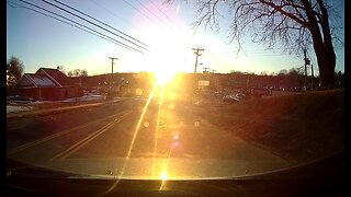 Blinding sun glare hides pedestrian on road