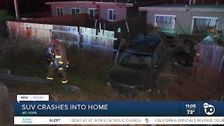 SUV crashes into Mount Hope home
