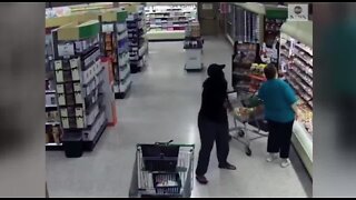 Woman steals wallet at grocery store