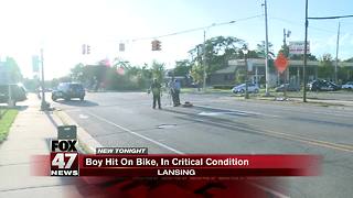 Boy, 10, on bike hit by SUV near downtown Lansing