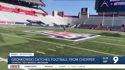 Rob Gronkowski catches football from helicopter