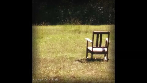 Vixage - A Chair In A Field