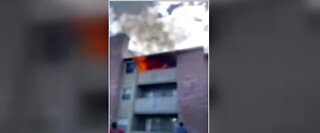 3-year-old dropped from burning apartment