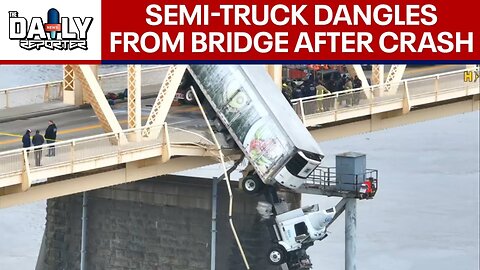 Driver rescued after semi-truck dangles from bridge