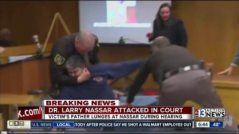 Father tries to attack Dr. Larry Nassar in court