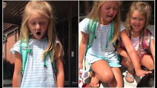 Girl gets super excited when she gets a dog as a present