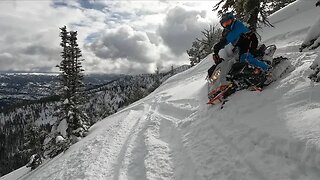 Short Mountain Climb and A long Trip Back Down. Snowmobiling Near McCall Idaho.