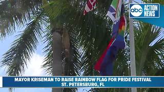 St. Pete Mayor Rick Kriseman raises rainbow flag over City Hall for this weekend's pride festival