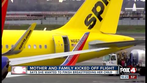 Spirit boots breast-feeding woman from plane