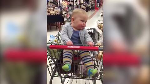 "Baby Dances In Grocery Cart"