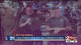 Earth-to-space call between NASA astronauts and local students