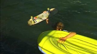 Skater lands in rubber boat