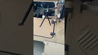 Half doors and M249 installed on the HMMWV