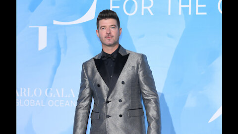 Robin Thicke admits he chased fame