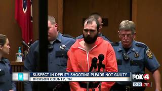 Man accused of killing a police officer pleads not guilty