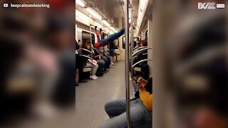 Spider-Man entertains subway passengers
