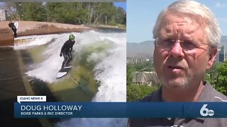 Surfers hang ten on the expert wave in the Boise whitewater park