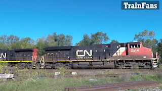 Manifest Train CN 2314 & CN 2727 Locomotives East Through Woodstock's Carew Diamond