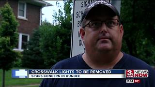 Signs say Dundee crosswalk lights to be removed