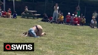 Hilarious moment mum faceplants and moons crowd during parents' race
