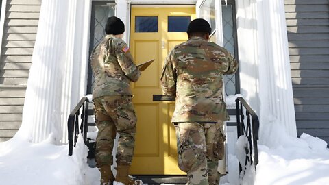 National Guard Checks Homes In Buffalo For Blizzard Victims