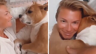 Pup Shares Warm & Fuzzy Morning Hugs With Owner