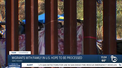 Migrants with family in US hope to be processed at San Ysidro border