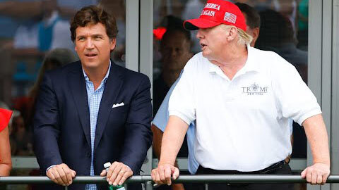 TUCKER CARLSON ACCEPTS NEWSMAX OWNERSHIP OFFER IF RIVAL TO FOX OFFERS CONTROL OF NETWORK FUTURE