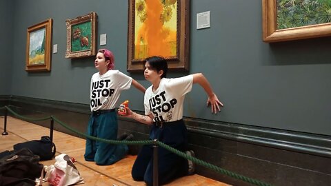 CHILDISH CLIMATE ACTIVISTS THROW TOMATO SOUP AT VAN GOGH'S SUNFLOWERS PAINTING