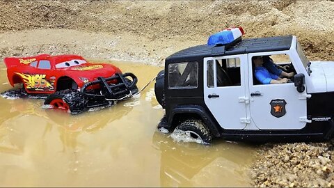 Police car rescue Mcqueen car from the swamp