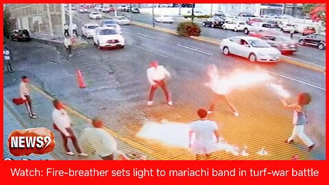 Watch Fire-breather sets light to mariachi band in turf-war battle