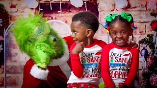 The Grinch scares kids during Christmas photoshoot