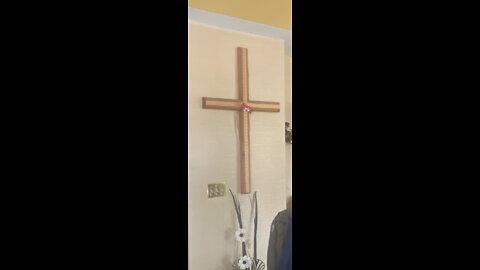 Small orb caught on my security cam, the orb was checking out the wood cross in my living room