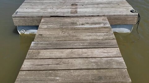 Our Homemade Floating Dock using 55 Gallon Plastic Barrels