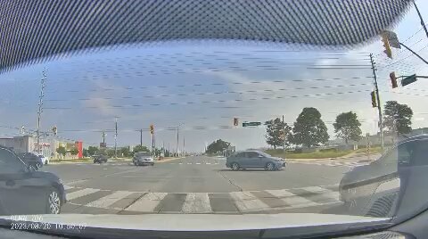 Reckless Turn At Stop Light In Toronto